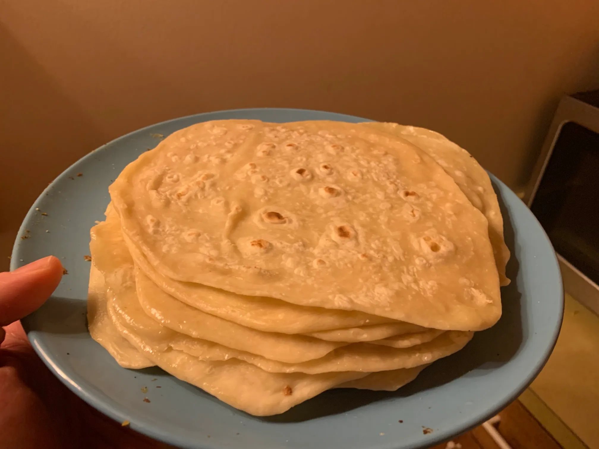 A stack of hand rolled tortillas